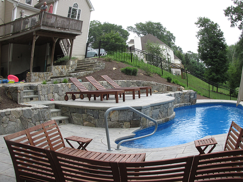 Swimming pool and stamped concrete project example 11